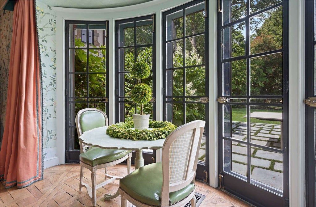 339 Duck Pond Road, Locust Valley, New York is a one of a kind home originally built in 1926 in the prestigious Village of Matinecock with exceptional amenities including a pool, pool house, tennis court, outdoor kitchen, gardens and terraces. elevator, nest system, 3,000 bottle wine cellar, art studio and more.