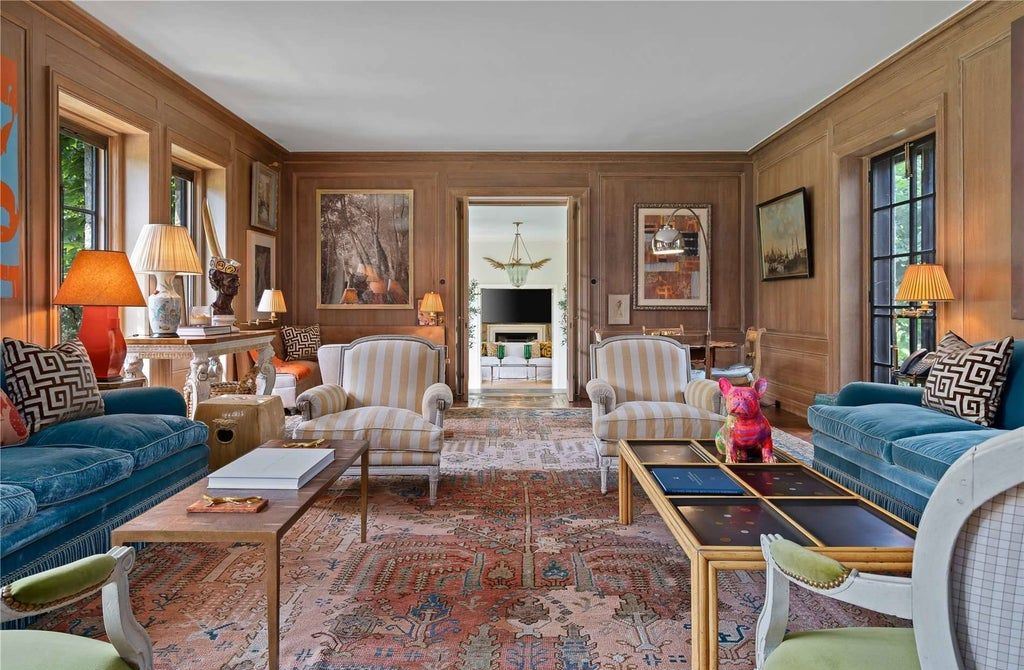 339 Duck Pond Road, Locust Valley, New York is a one of a kind home originally built in 1926 in the prestigious Village of Matinecock with exceptional amenities including a pool, pool house, tennis court, outdoor kitchen, gardens and terraces. elevator, nest system, 3,000 bottle wine cellar, art studio and more.