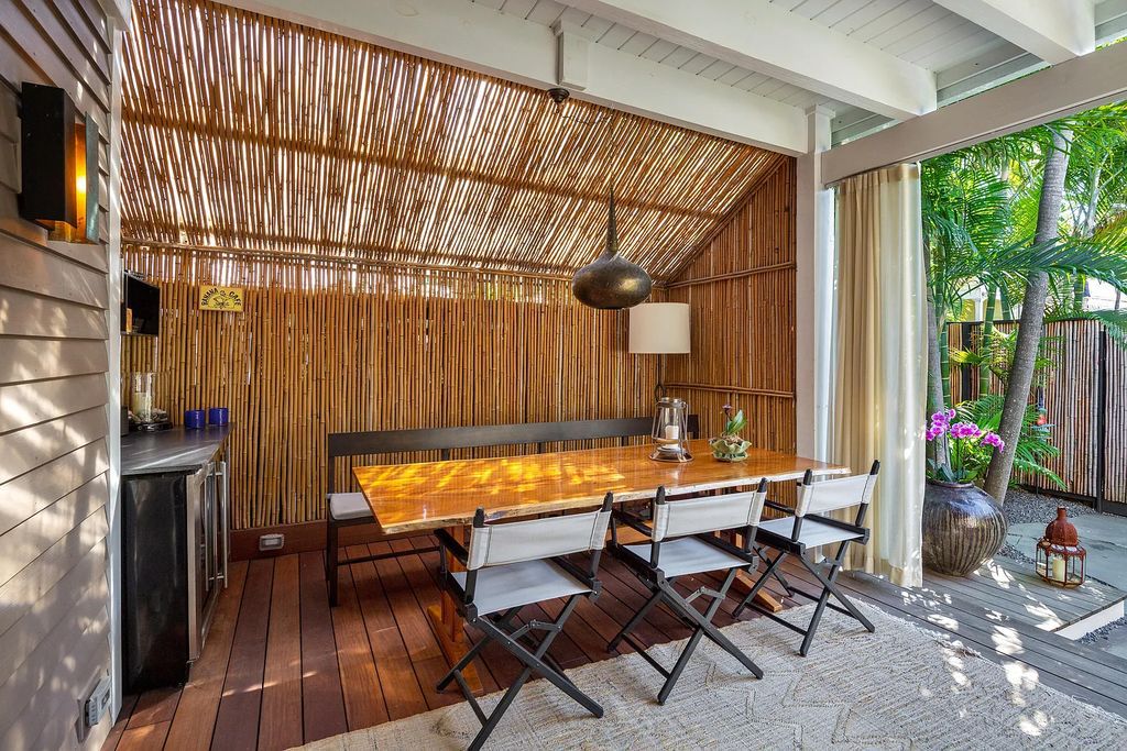 322 Elizabeth Street, Key West, Florida, was built around 1890 by ship captain Benjamin Saunders and has recently been beautifully restored. This classic revival home is located in the heart of Old Town, two blocks from downtown Duval Street and close to the historic seaport, restaurants, and attractions.