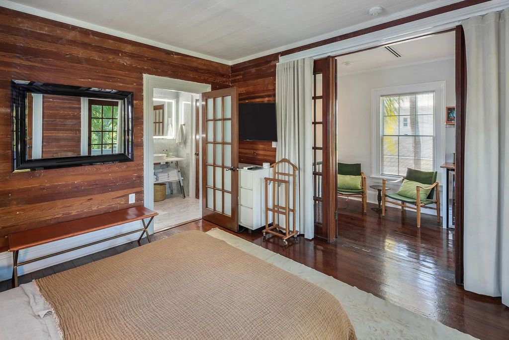 322 Elizabeth Street, Key West, Florida, was built around 1890 by ship captain Benjamin Saunders and has recently been beautifully restored. This classic revival home is located in the heart of Old Town, two blocks from downtown Duval Street and close to the historic seaport, restaurants, and attractions.