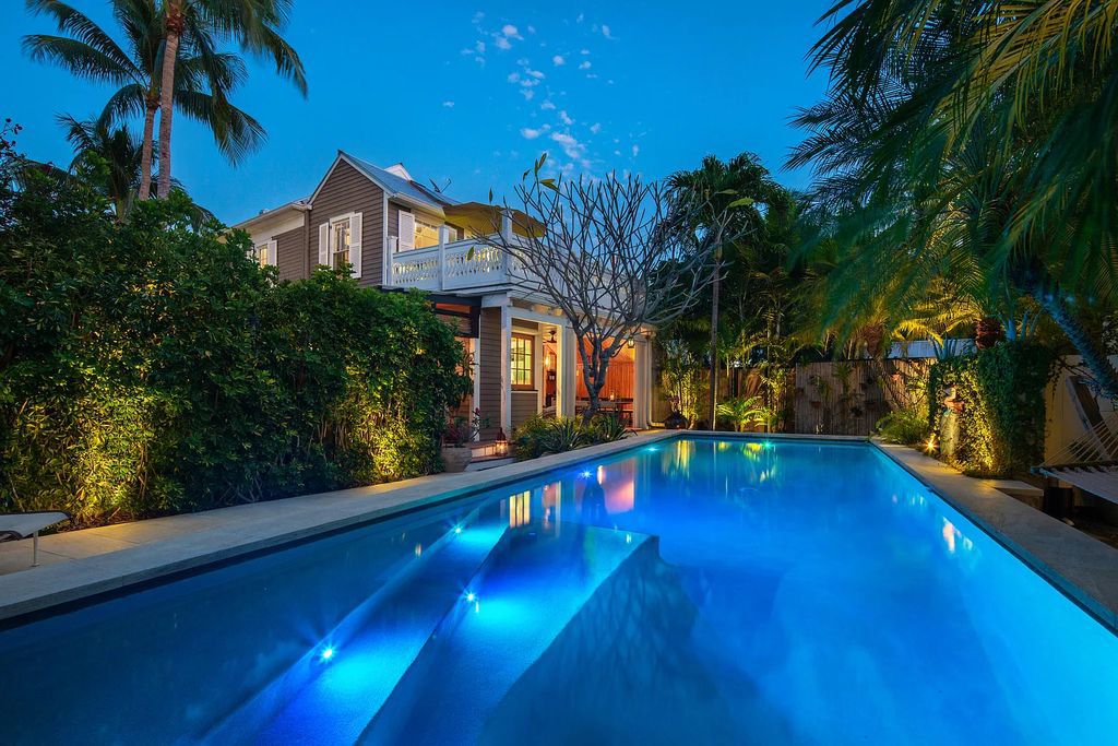 322 Elizabeth Street, Key West, Florida, was built around 1890 by ship captain Benjamin Saunders and has recently been beautifully restored. This classic revival home is located in the heart of Old Town, two blocks from downtown Duval Street and close to the historic seaport, restaurants, and attractions.