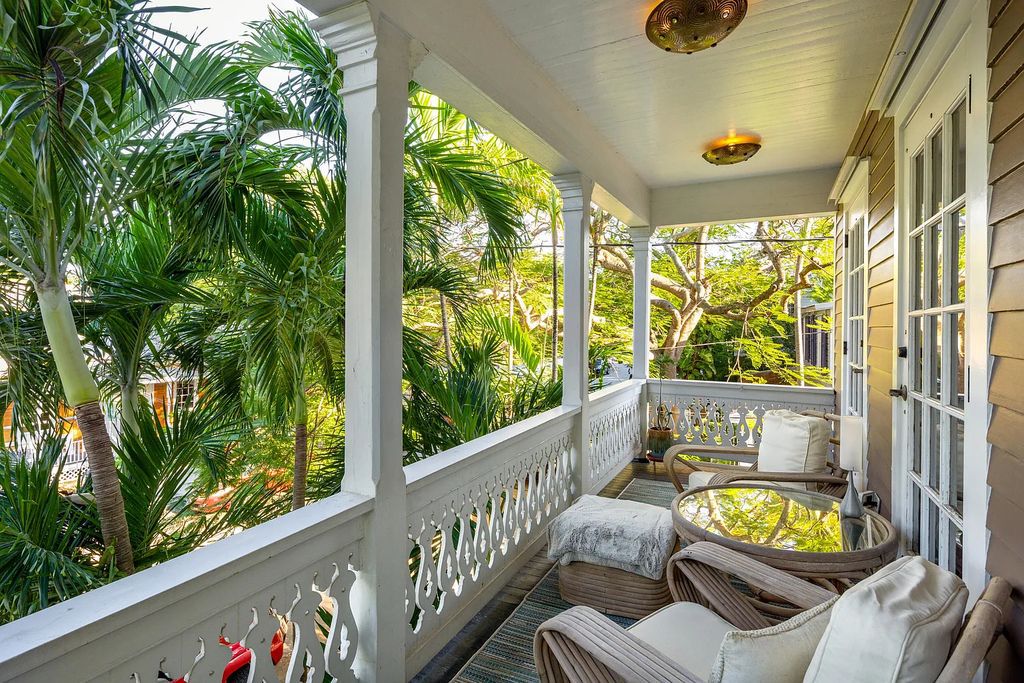 322 Elizabeth Street, Key West, Florida, was built around 1890 by ship captain Benjamin Saunders and has recently been beautifully restored. This classic revival home is located in the heart of Old Town, two blocks from downtown Duval Street and close to the historic seaport, restaurants, and attractions.