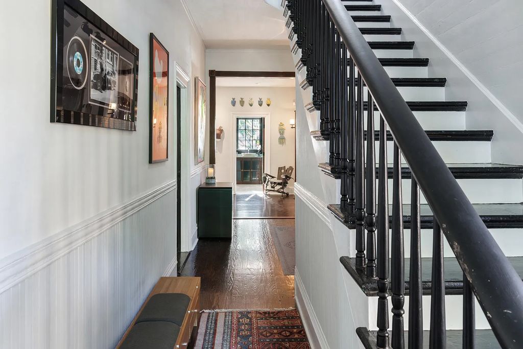 322 Elizabeth Street, Key West, Florida, was built around 1890 by ship captain Benjamin Saunders and has recently been beautifully restored. This classic revival home is located in the heart of Old Town, two blocks from downtown Duval Street and close to the historic seaport, restaurants, and attractions.