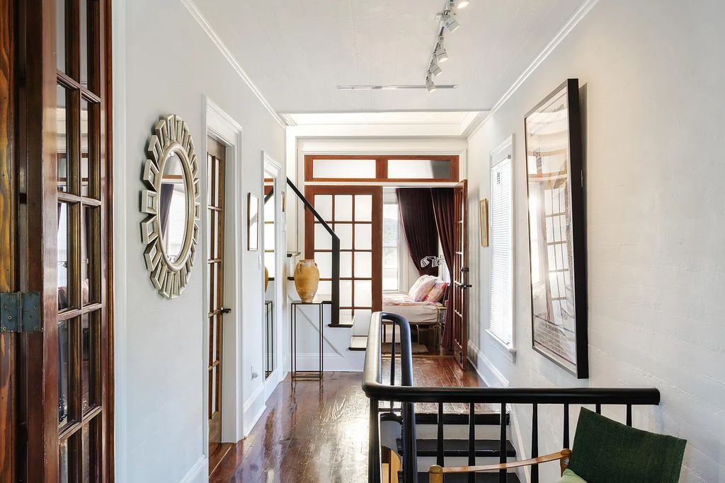 322 Elizabeth Street, Key West, Florida, was built around 1890 by ship captain Benjamin Saunders and has recently been beautifully restored. This classic revival home is located in the heart of Old Town, two blocks from downtown Duval Street and close to the historic seaport, restaurants, and attractions.