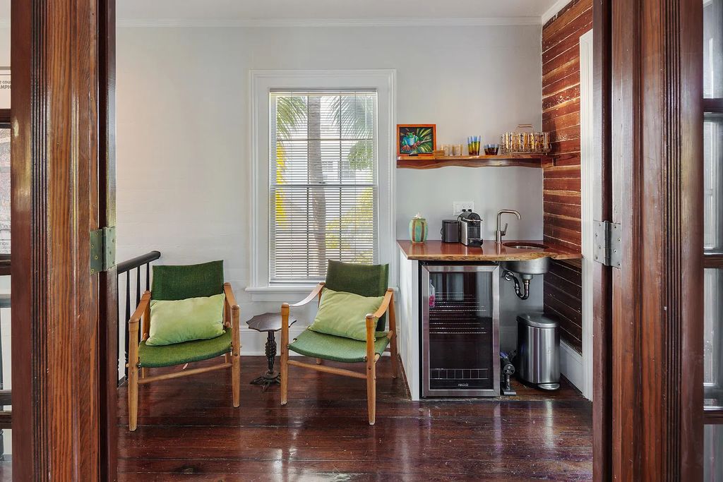 322 Elizabeth Street, Key West, Florida, was built around 1890 by ship captain Benjamin Saunders and has recently been beautifully restored. This classic revival home is located in the heart of Old Town, two blocks from downtown Duval Street and close to the historic seaport, restaurants, and attractions.