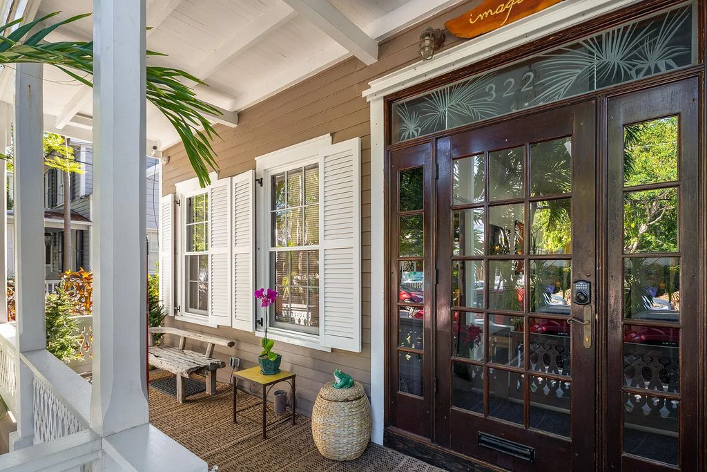 322 Elizabeth Street, Key West, Florida, was built around 1890 by ship captain Benjamin Saunders and has recently been beautifully restored. This classic revival home is located in the heart of Old Town, two blocks from downtown Duval Street and close to the historic seaport, restaurants, and attractions.