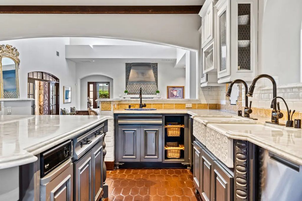 4225 N Jensen Street, Las Vegas, Nevada is a Hacienda-style home on 2.25 lush acres beaming with Spanish tile, rustic wood accents, archways, and multiple courtyards that allow for the ultimate year-round indoor outdoor living. 
