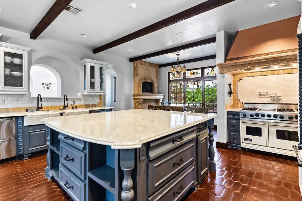 4225 N Jensen Street, Las Vegas, Nevada is a Hacienda-style home on 2.25 lush acres beaming with Spanish tile, rustic wood accents, archways, and multiple courtyards that allow for the ultimate year-round indoor outdoor living. 