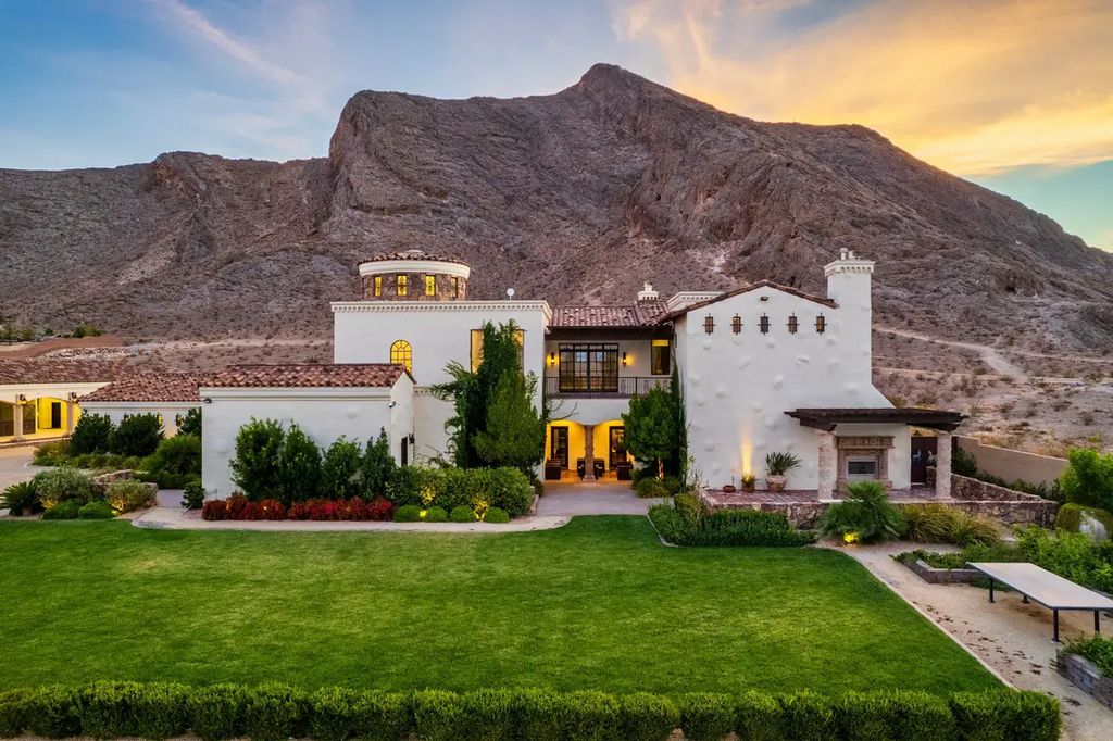 4225 N Jensen Street, Las Vegas, Nevada is a Hacienda-style home on 2.25 lush acres beaming with Spanish tile, rustic wood accents, archways, and multiple courtyards that allow for the ultimate year-round indoor outdoor living. 