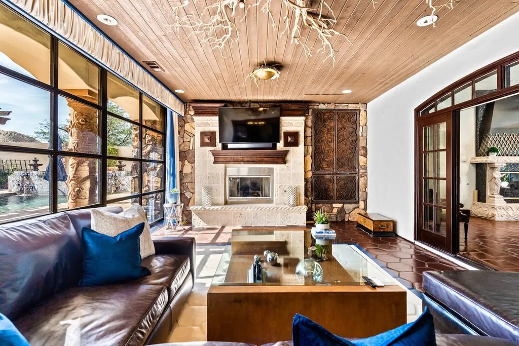 4225 N Jensen Street, Las Vegas, Nevada is a Hacienda-style home on 2.25 lush acres beaming with Spanish tile, rustic wood accents, archways, and multiple courtyards that allow for the ultimate year-round indoor outdoor living. 