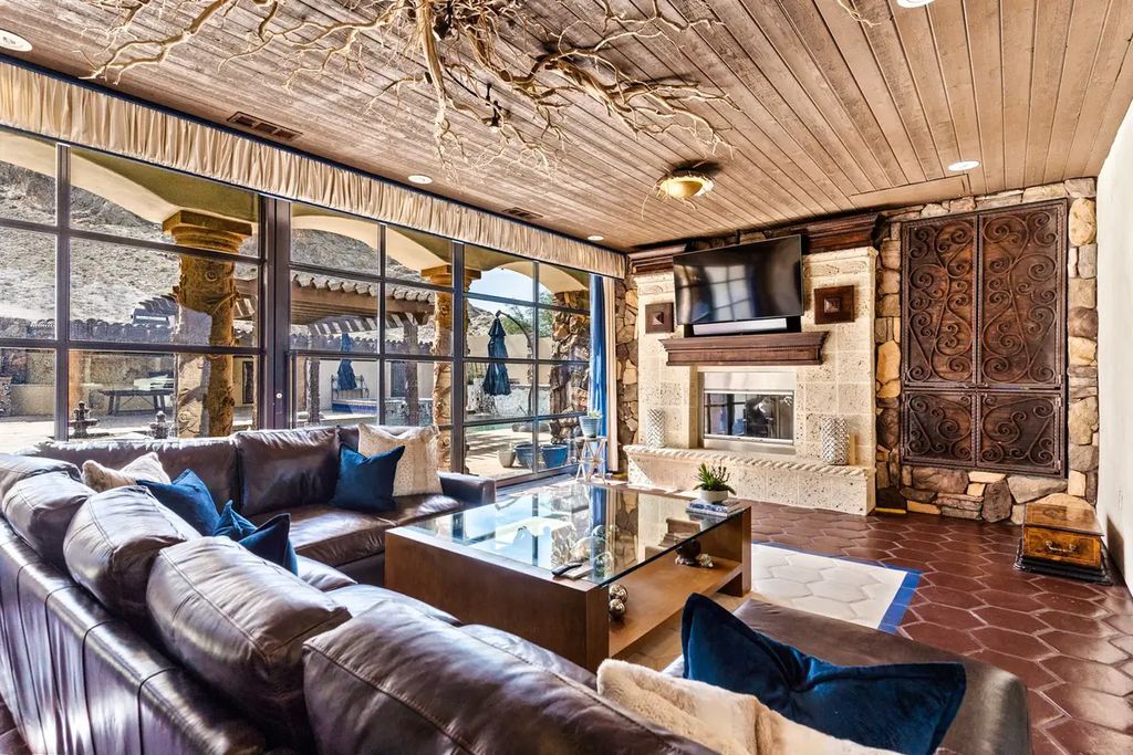 4225 N Jensen Street, Las Vegas, Nevada is a Hacienda-style home on 2.25 lush acres beaming with Spanish tile, rustic wood accents, archways, and multiple courtyards that allow for the ultimate year-round indoor outdoor living. 