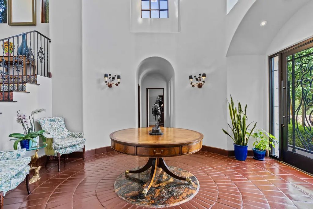 4225 N Jensen Street, Las Vegas, Nevada is a Hacienda-style home on 2.25 lush acres beaming with Spanish tile, rustic wood accents, archways, and multiple courtyards that allow for the ultimate year-round indoor outdoor living. 