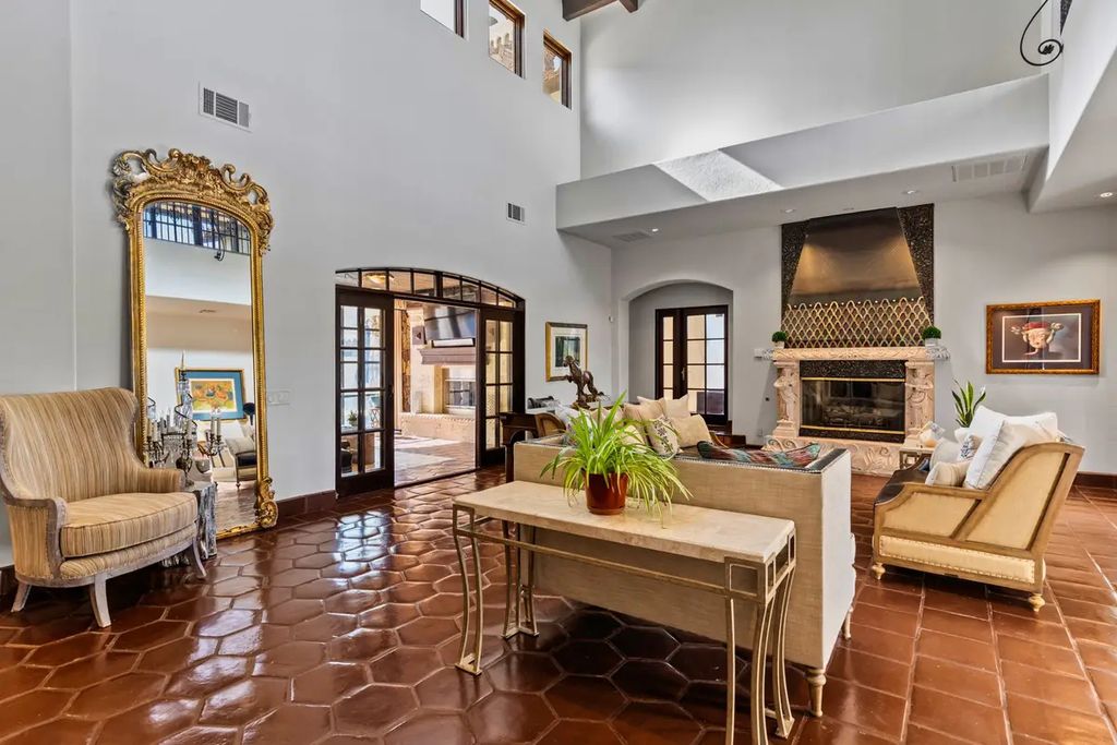 4225 N Jensen Street, Las Vegas, Nevada is a Hacienda-style home on 2.25 lush acres beaming with Spanish tile, rustic wood accents, archways, and multiple courtyards that allow for the ultimate year-round indoor outdoor living. 