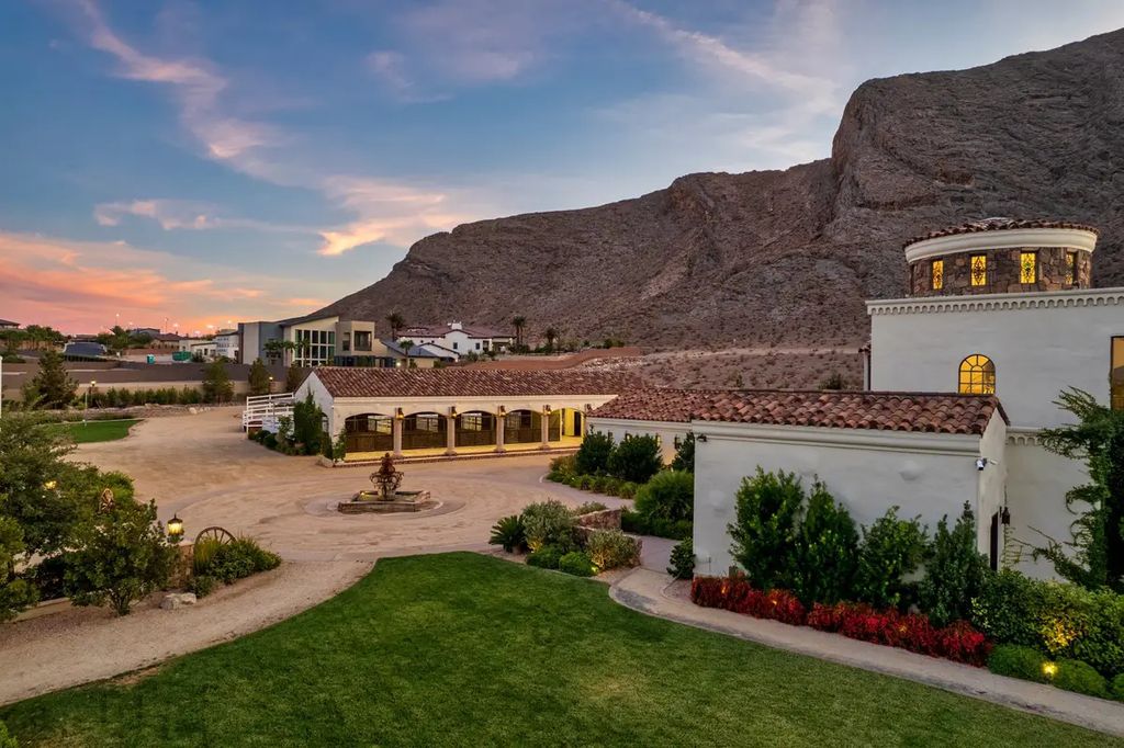 4225 N Jensen Street, Las Vegas, Nevada is a Hacienda-style home on 2.25 lush acres beaming with Spanish tile, rustic wood accents, archways, and multiple courtyards that allow for the ultimate year-round indoor outdoor living. 