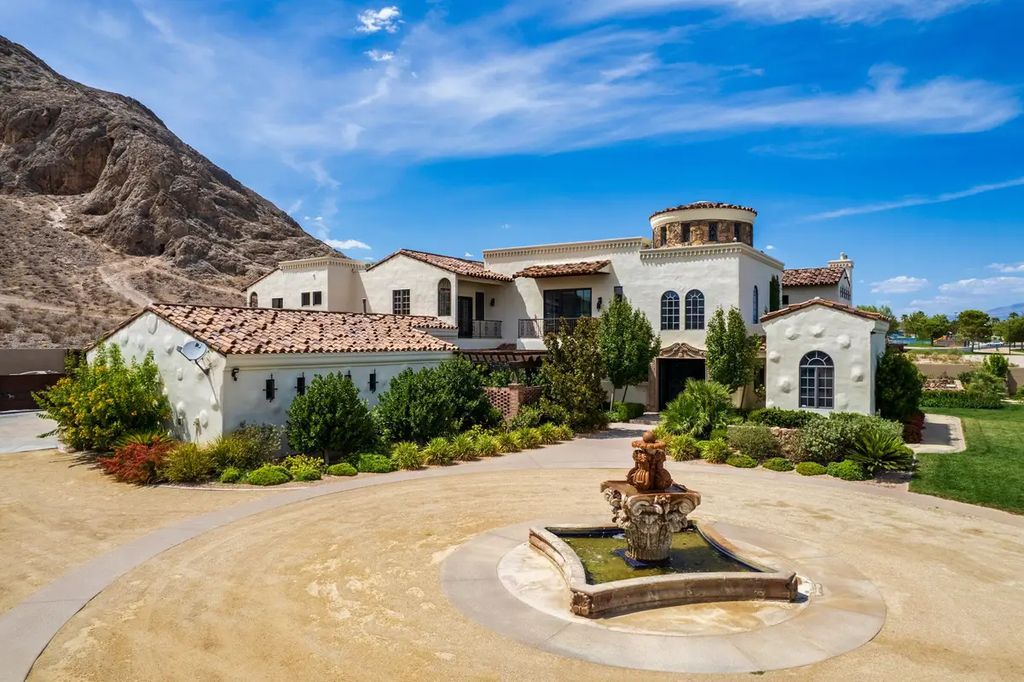 4225 N Jensen Street, Las Vegas, Nevada is a Hacienda-style home on 2.25 lush acres beaming with Spanish tile, rustic wood accents, archways, and multiple courtyards that allow for the ultimate year-round indoor outdoor living. 