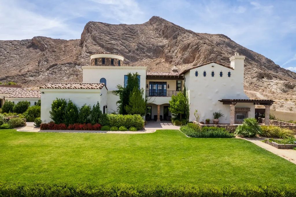 4225 N Jensen Street, Las Vegas, Nevada is a Hacienda-style home on 2.25 lush acres beaming with Spanish tile, rustic wood accents, archways, and multiple courtyards that allow for the ultimate year-round indoor outdoor living. 