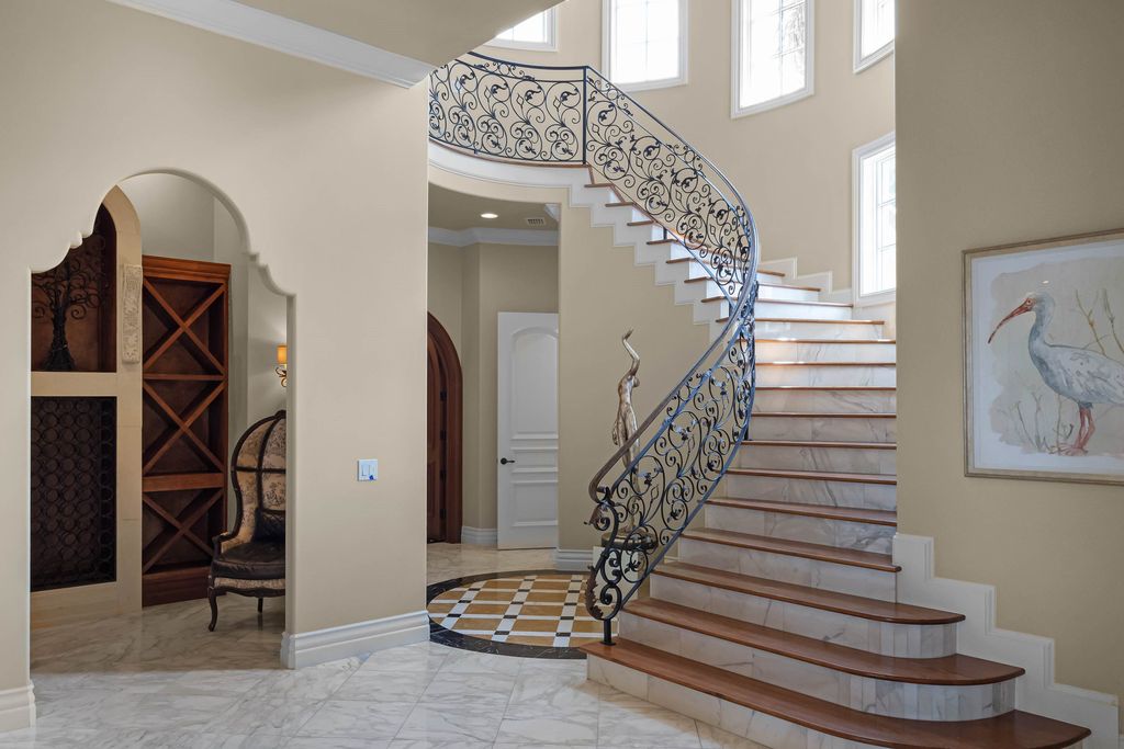 16631 Arezo Court, Montverde, Florida is a one of a kind custom home located in the sought after Bella Collina Community, finest in architectural design and handcrafted artistry, superb construction and is completely and exquisitely furnished.
