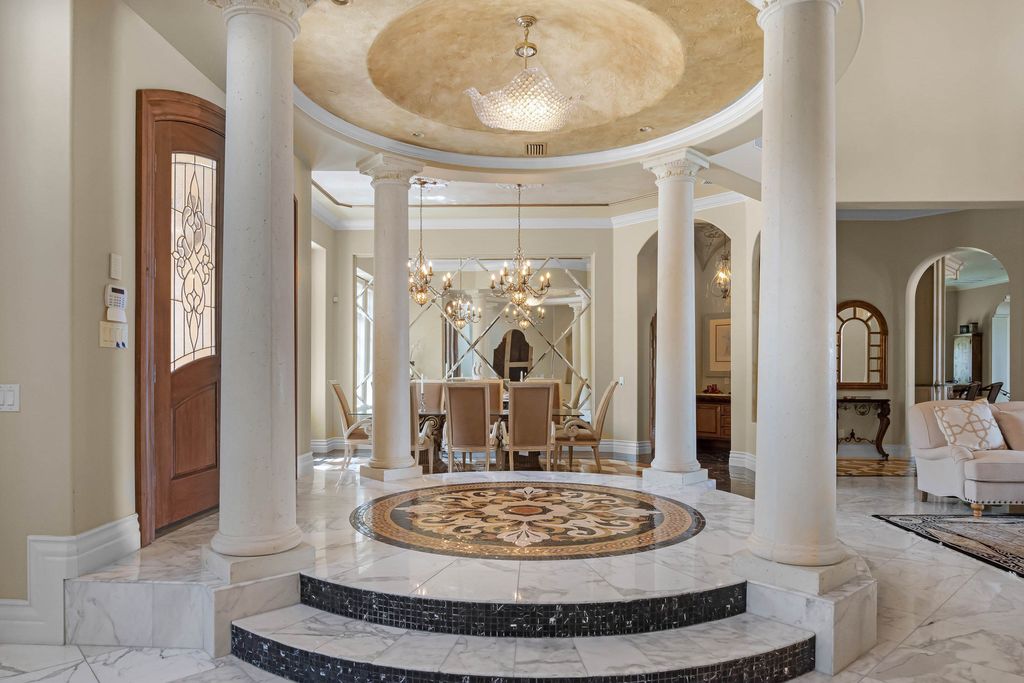 16631 Arezo Court, Montverde, Florida is a one of a kind custom home located in the sought after Bella Collina Community, finest in architectural design and handcrafted artistry, superb construction and is completely and exquisitely furnished.