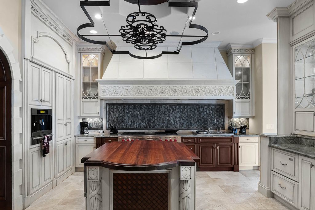16631 Arezo Court, Montverde, Florida is a one of a kind custom home located in the sought after Bella Collina Community, finest in architectural design and handcrafted artistry, superb construction and is completely and exquisitely furnished.