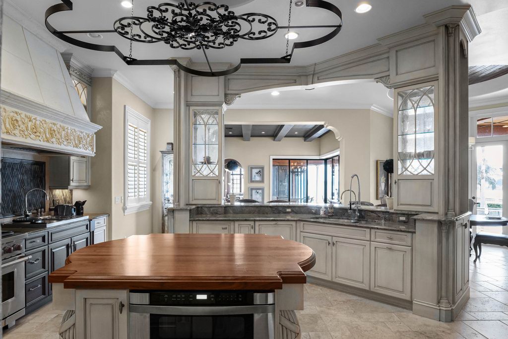 16631 Arezo Court, Montverde, Florida is a one of a kind custom home located in the sought after Bella Collina Community, finest in architectural design and handcrafted artistry, superb construction and is completely and exquisitely furnished.