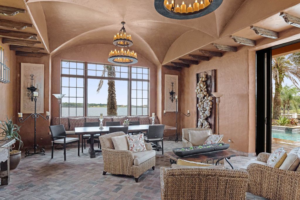 16631 Arezo Court, Montverde, Florida is a one of a kind custom home located in the sought after Bella Collina Community, finest in architectural design and handcrafted artistry, superb construction and is completely and exquisitely furnished.