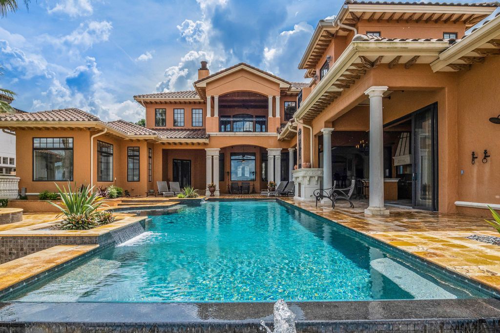16631 Arezo Court, Montverde, Florida is a one of a kind custom home located in the sought after Bella Collina Community, finest in architectural design and handcrafted artistry, superb construction and is completely and exquisitely furnished.