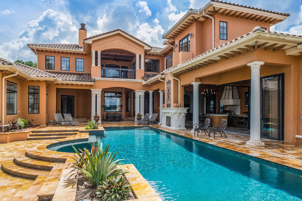 16631 Arezo Court, Montverde, Florida is a one of a kind custom home located in the sought after Bella Collina Community, finest in architectural design and handcrafted artistry, superb construction and is completely and exquisitely furnished.