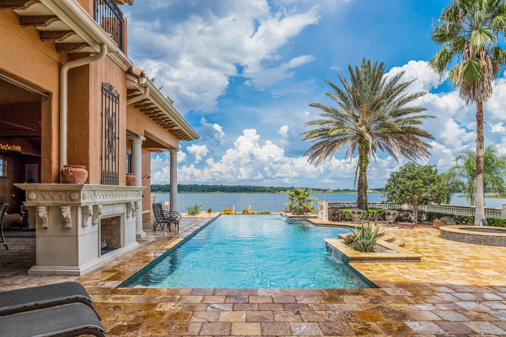 16631 Arezo Court, Montverde, Florida is a one of a kind custom home located in the sought after Bella Collina Community, finest in architectural design and handcrafted artistry, superb construction and is completely and exquisitely furnished.