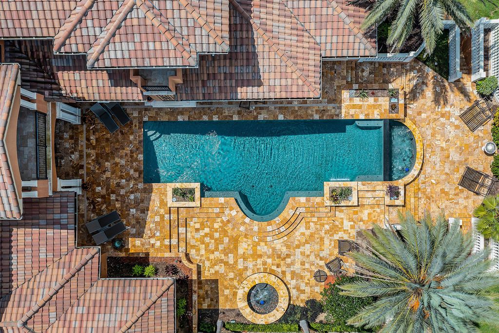16631 Arezo Court, Montverde, Florida is a one of a kind custom home located in the sought after Bella Collina Community, finest in architectural design and handcrafted artistry, superb construction and is completely and exquisitely furnished.