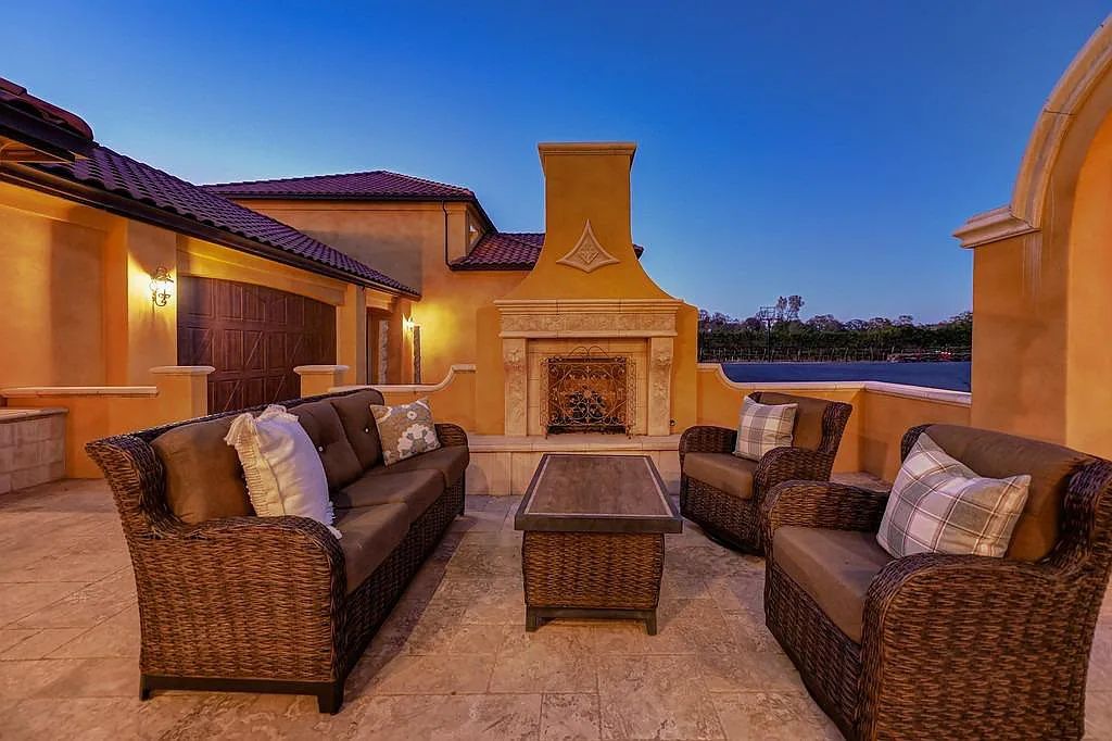 100 Shultz Vineyard Road, Shingle Springs, California is an architectural masterpiece overlooks a gorgeous working vineyard including state of the art appliances, high-end fixtures and finishes, custom iron works, and hand carved marble fireplaces and soaking tub.