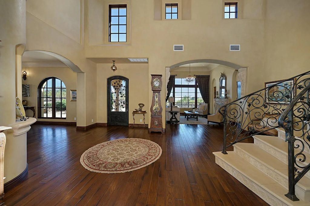100 Shultz Vineyard Road, Shingle Springs, California is an architectural masterpiece overlooks a gorgeous working vineyard including state of the art appliances, high-end fixtures and finishes, custom iron works, and hand carved marble fireplaces and soaking tub.