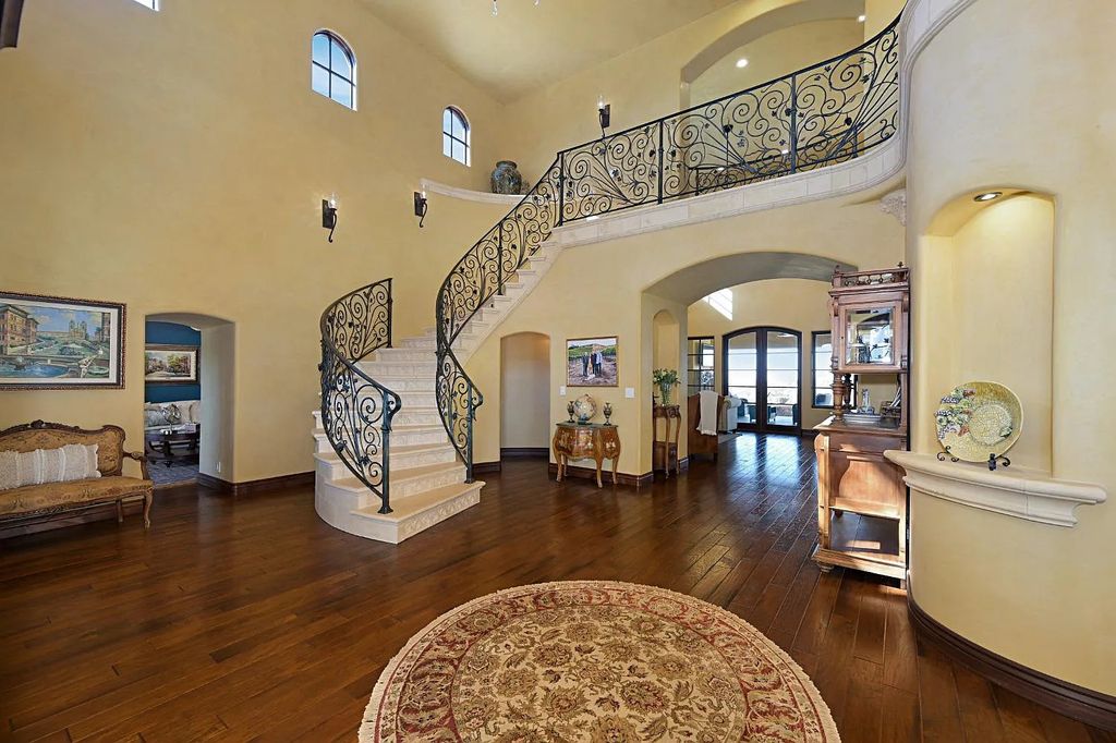 100 Shultz Vineyard Road, Shingle Springs, California is an architectural masterpiece overlooks a gorgeous working vineyard including state of the art appliances, high-end fixtures and finishes, custom iron works, and hand carved marble fireplaces and soaking tub.