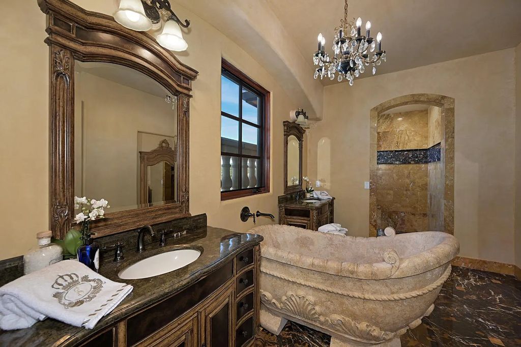 100 Shultz Vineyard Road, Shingle Springs, California is an architectural masterpiece overlooks a gorgeous working vineyard including state of the art appliances, high-end fixtures and finishes, custom iron works, and hand carved marble fireplaces and soaking tub.