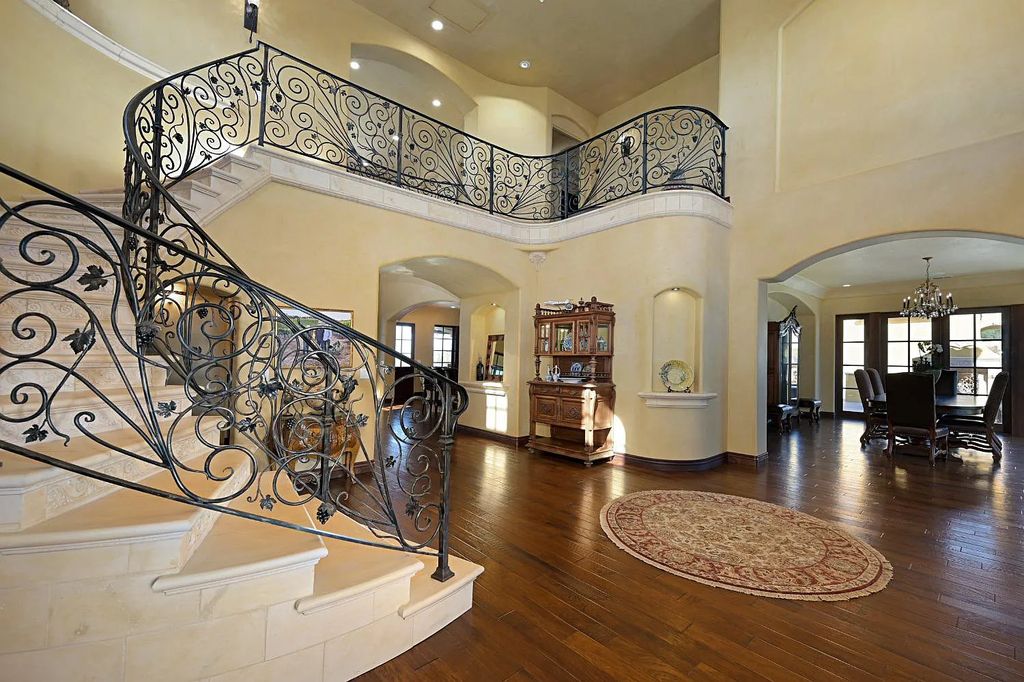 100 Shultz Vineyard Road, Shingle Springs, California is an architectural masterpiece overlooks a gorgeous working vineyard including state of the art appliances, high-end fixtures and finishes, custom iron works, and hand carved marble fireplaces and soaking tub.