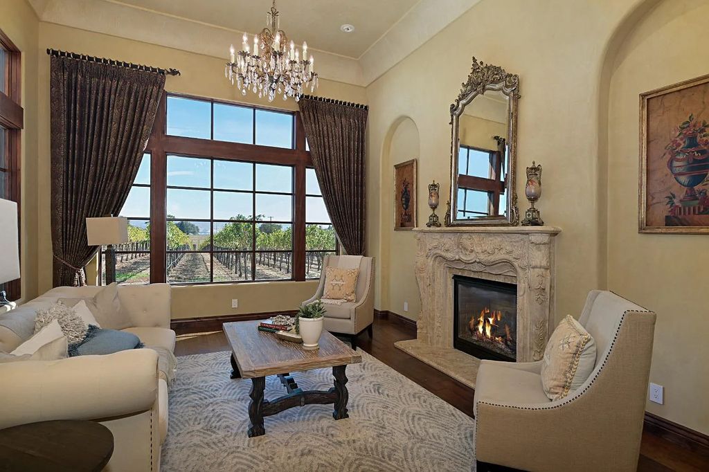 100 Shultz Vineyard Road, Shingle Springs, California is an architectural masterpiece overlooks a gorgeous working vineyard including state of the art appliances, high-end fixtures and finishes, custom iron works, and hand carved marble fireplaces and soaking tub.