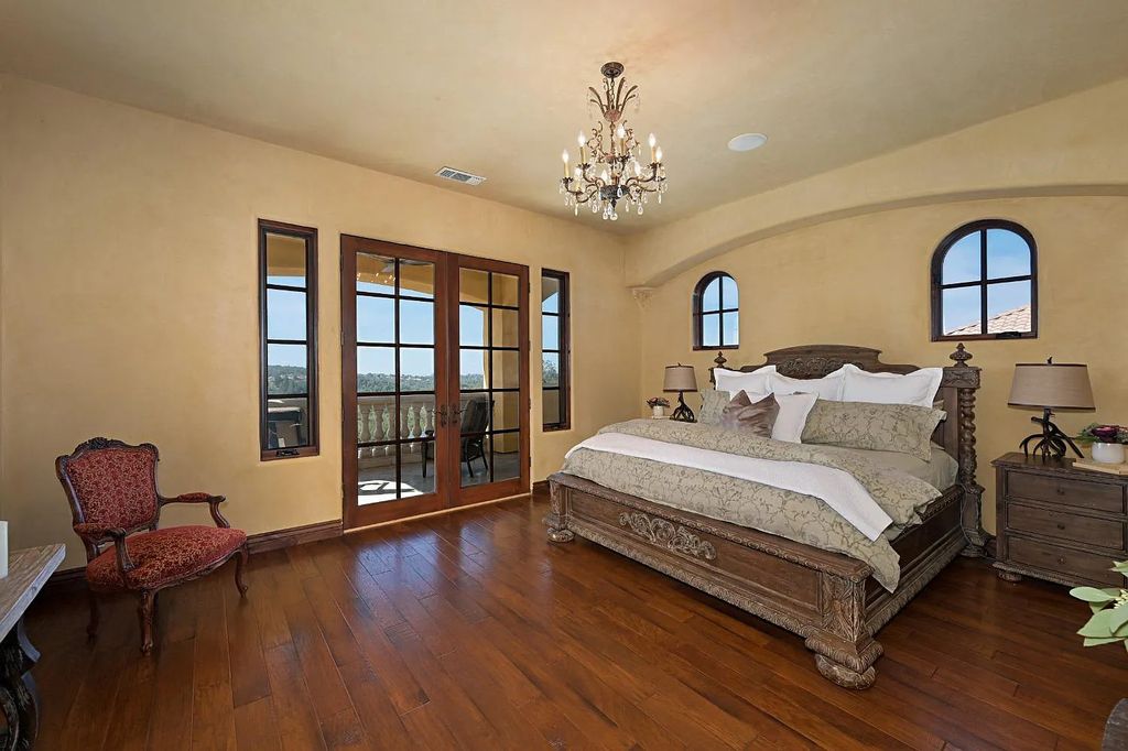 100 Shultz Vineyard Road, Shingle Springs, California is an architectural masterpiece overlooks a gorgeous working vineyard including state of the art appliances, high-end fixtures and finishes, custom iron works, and hand carved marble fireplaces and soaking tub.