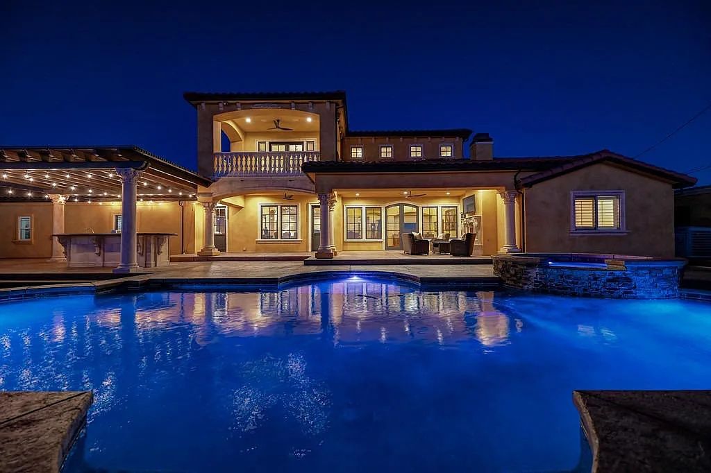 100 Shultz Vineyard Road, Shingle Springs, California is an architectural masterpiece overlooks a gorgeous working vineyard including state of the art appliances, high-end fixtures and finishes, custom iron works, and hand carved marble fireplaces and soaking tub.