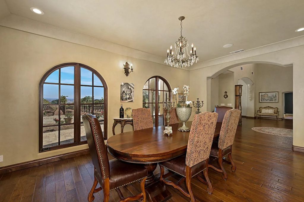 100 Shultz Vineyard Road, Shingle Springs, California is an architectural masterpiece overlooks a gorgeous working vineyard including state of the art appliances, high-end fixtures and finishes, custom iron works, and hand carved marble fireplaces and soaking tub.