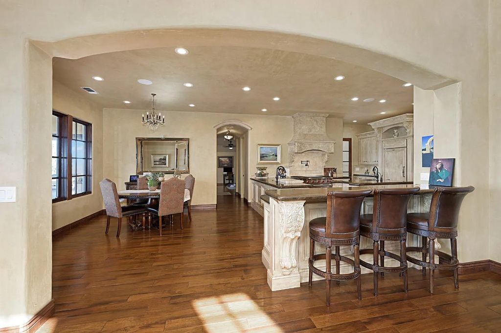 100 Shultz Vineyard Road, Shingle Springs, California is an architectural masterpiece overlooks a gorgeous working vineyard including state of the art appliances, high-end fixtures and finishes, custom iron works, and hand carved marble fireplaces and soaking tub.
