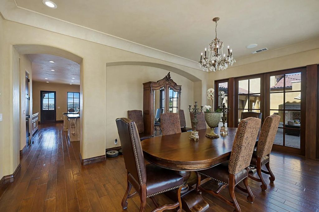 100 Shultz Vineyard Road, Shingle Springs, California is an architectural masterpiece overlooks a gorgeous working vineyard including state of the art appliances, high-end fixtures and finishes, custom iron works, and hand carved marble fireplaces and soaking tub.