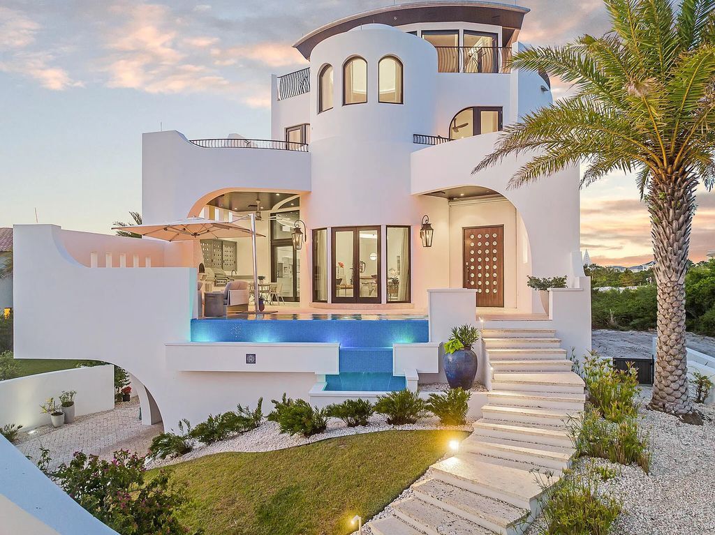 208 Paradise By The Sea Boulevard, Inlet Beach, Florida is a crown jewel majestically perched to offer incredible views with all construction materials has been meticulously selected and sourced from vendors around the world to provide only the most luxurious finishes and features.
