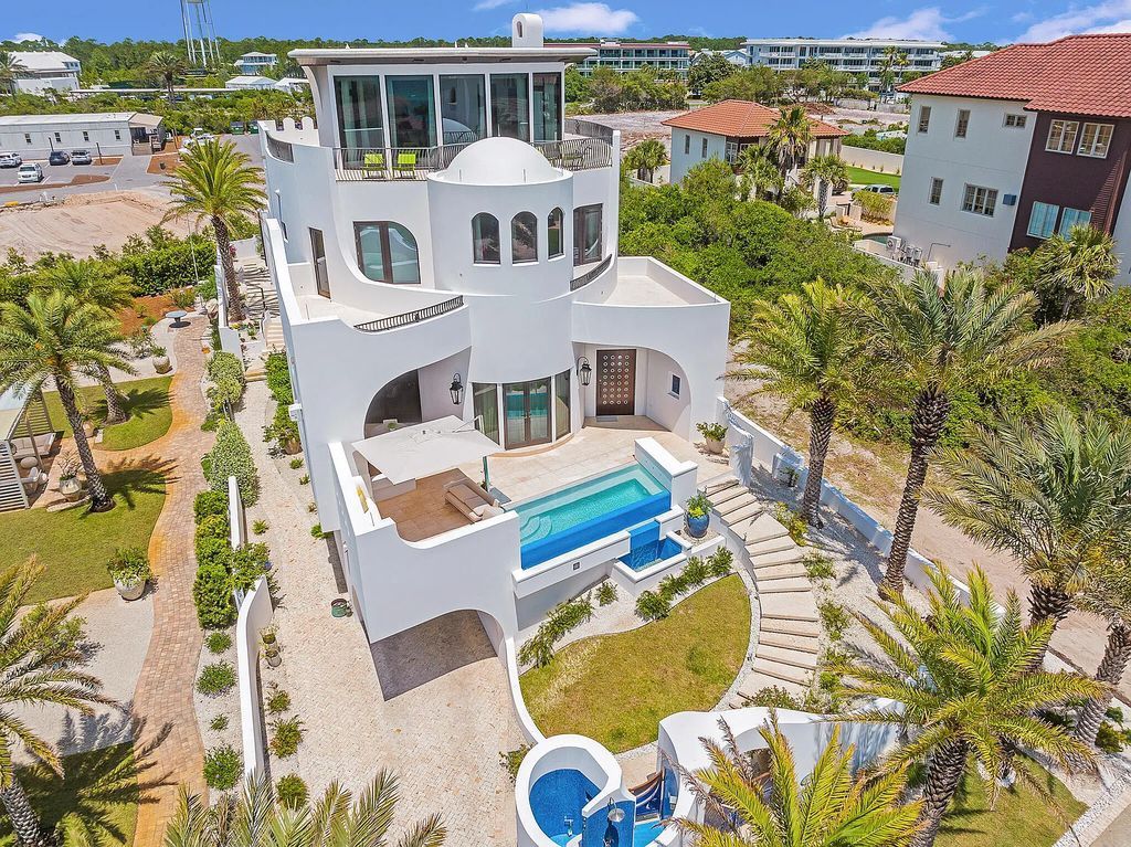 208 Paradise By The Sea Boulevard, Inlet Beach, Florida is a crown jewel majestically perched to offer incredible views with all construction materials has been meticulously selected and sourced from vendors around the world to provide only the most luxurious finishes and features.