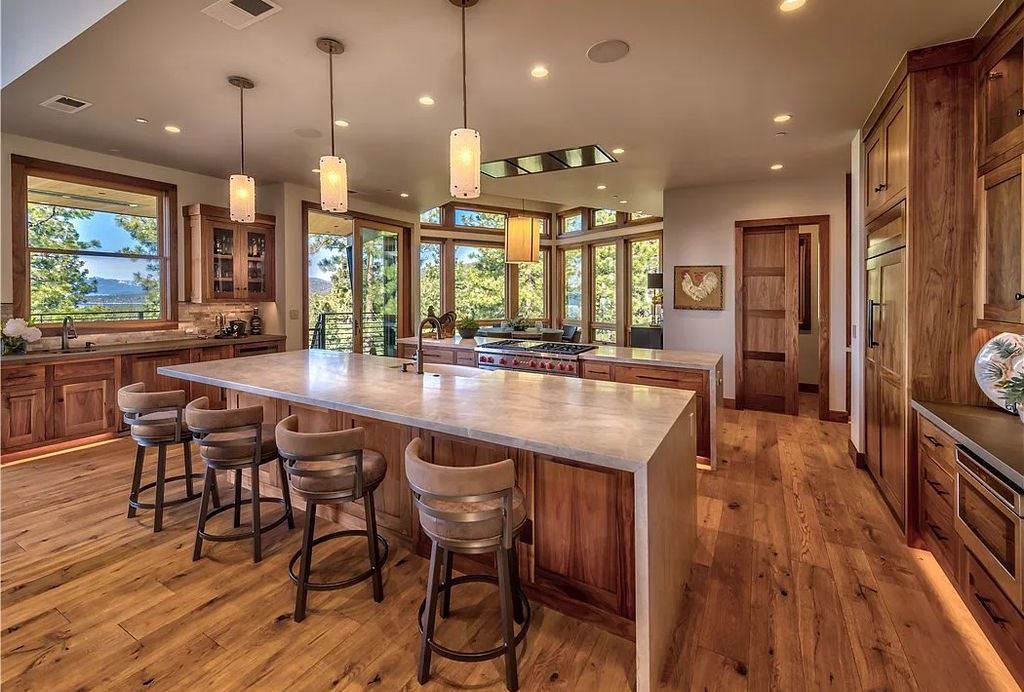545 Eagle Drive, Incline Village, Nevada is a spectacular estate was meticulously crafted Susie Yanagi AIA design with high quality finish work including double quartzite kitchen islands, gated drive and interior paver heated courtyard.