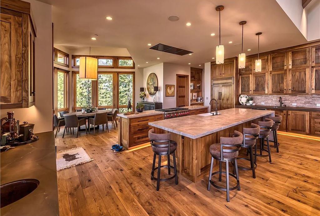 545 Eagle Drive, Incline Village, Nevada is a spectacular estate was meticulously crafted Susie Yanagi AIA design with high quality finish work including double quartzite kitchen islands, gated drive and interior paver heated courtyard.