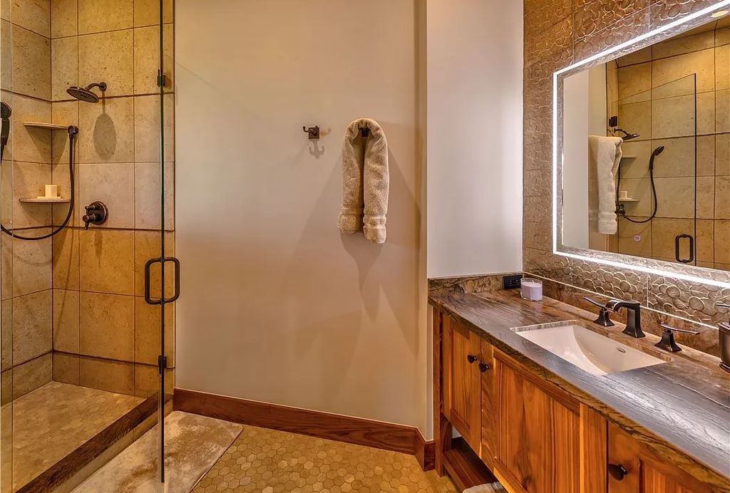 545 Eagle Drive, Incline Village, Nevada is a spectacular estate was meticulously crafted Susie Yanagi AIA design with high quality finish work including double quartzite kitchen islands, gated drive and interior paver heated courtyard.