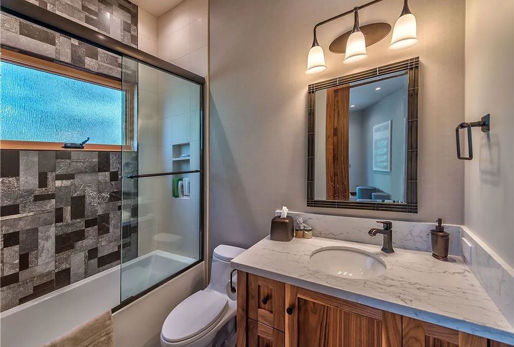 545 Eagle Drive, Incline Village, Nevada is a spectacular estate was meticulously crafted Susie Yanagi AIA design with high quality finish work including double quartzite kitchen islands, gated drive and interior paver heated courtyard.