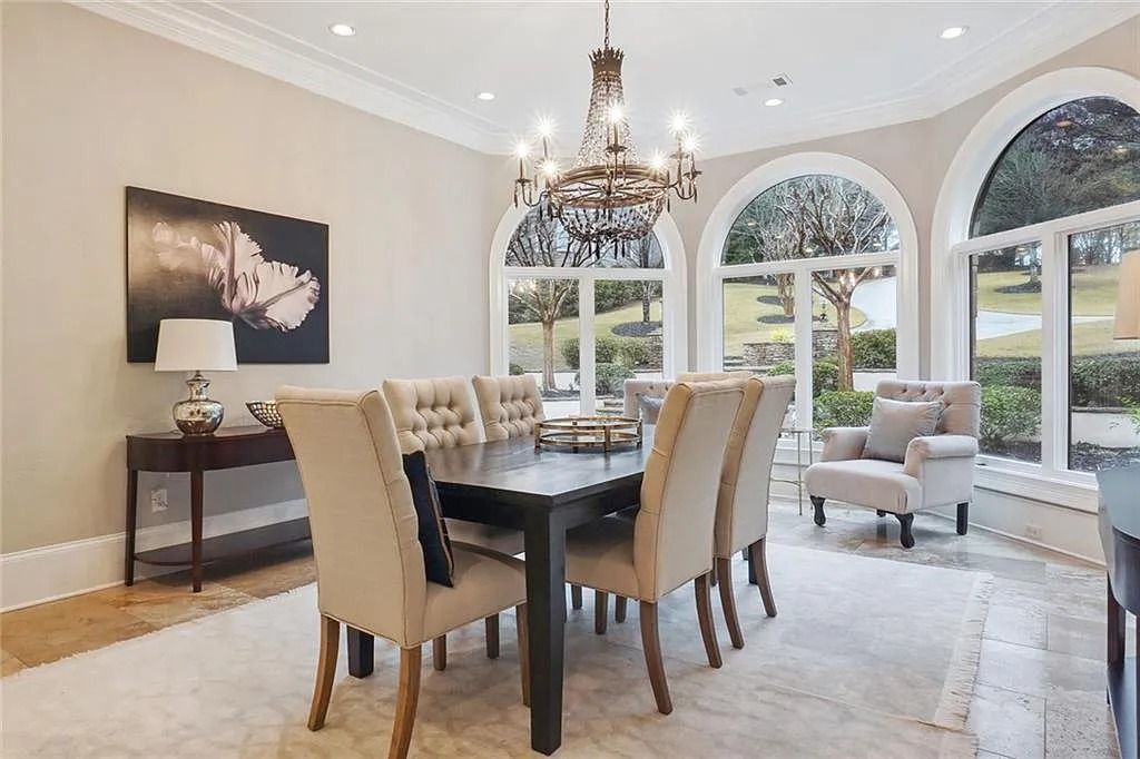 The Estate in Buford is a luxurious home offering the ultimate in privacy now available for sale. This home located at 6617 Garrett Rd, Buford, Georgia; offering 06 bedrooms and 07 bathrooms with 10,200 square feet of living spaces.