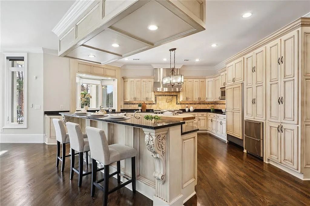 The Estate in Buford is a luxurious home offering the ultimate in privacy now available for sale. This home located at 6617 Garrett Rd, Buford, Georgia; offering 06 bedrooms and 07 bathrooms with 10,200 square feet of living spaces.