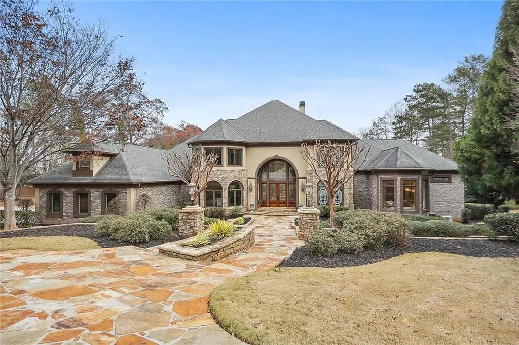 The Estate in Buford is a luxurious home offering the ultimate in privacy now available for sale. This home located at 6617 Garrett Rd, Buford, Georgia; offering 06 bedrooms and 07 bathrooms with 10,200 square feet of living spaces.