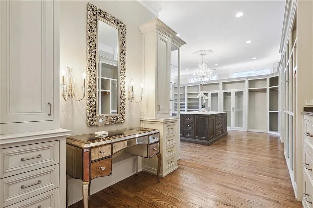 The Estate in Buford is a luxurious home offering the ultimate in privacy now available for sale. This home located at 6617 Garrett Rd, Buford, Georgia; offering 06 bedrooms and 07 bathrooms with 10,200 square feet of living spaces.